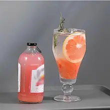 لیوان پایه‌دار مدل بال گنجایش 480 سی‌سی مناسب سرو نوشیدنی گرم و سرد